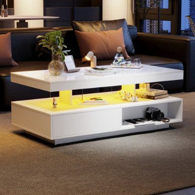 Modern high gloss white LED coffee table featuring 2 drawers, open shelves and 16-colour LED lighting for a stylish living room.
